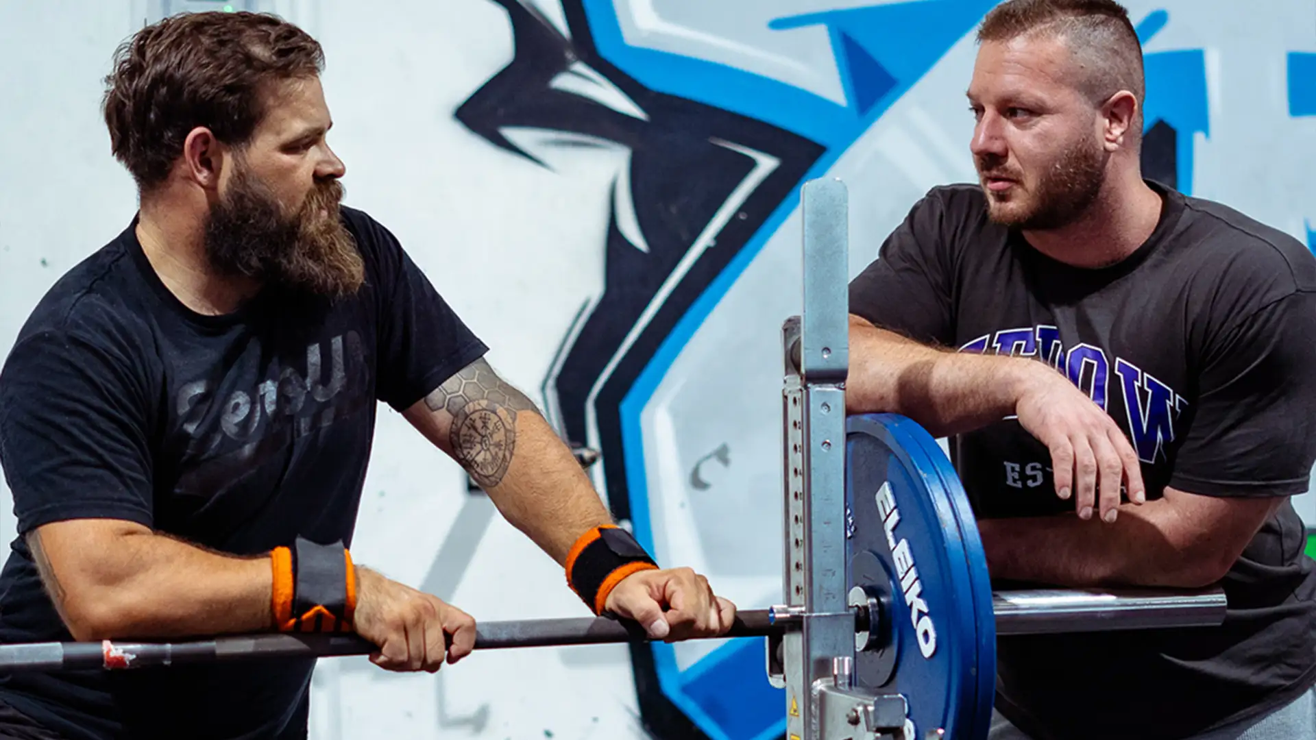 Powerlifting coaching session between a ZeroW coach and an athlete